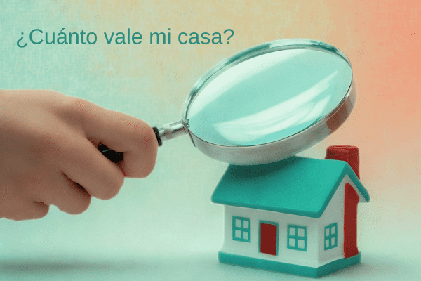 Conoce el valor de una casa en el mercado inmobiliario actual 2 una-mano-con-una-lupa-sobre-una-casa-de-juguete-representa-saber-el valor- de-una-casa